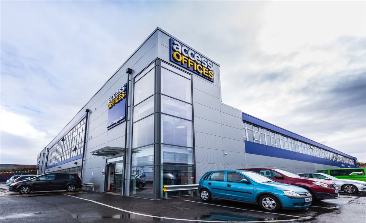 Modern grey and blue exterior of 62 Portman Road, Reading, Berkshire with glass corner entrance.
