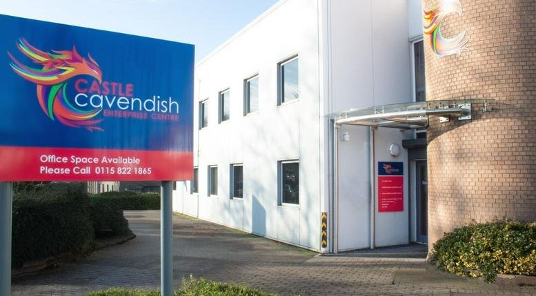 Exterior view of the white facade and entrance of Castle Cavendish at 63-67 Saint Peter’s Street.