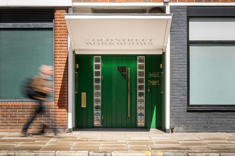 Exterior entrance with a bright green door at Old Street WorkRooms, 69 Old Street.