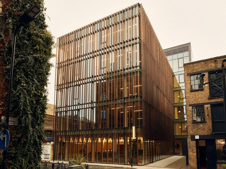 Exterior view of the sustainable timber-slatted facade of The Black & White Building.