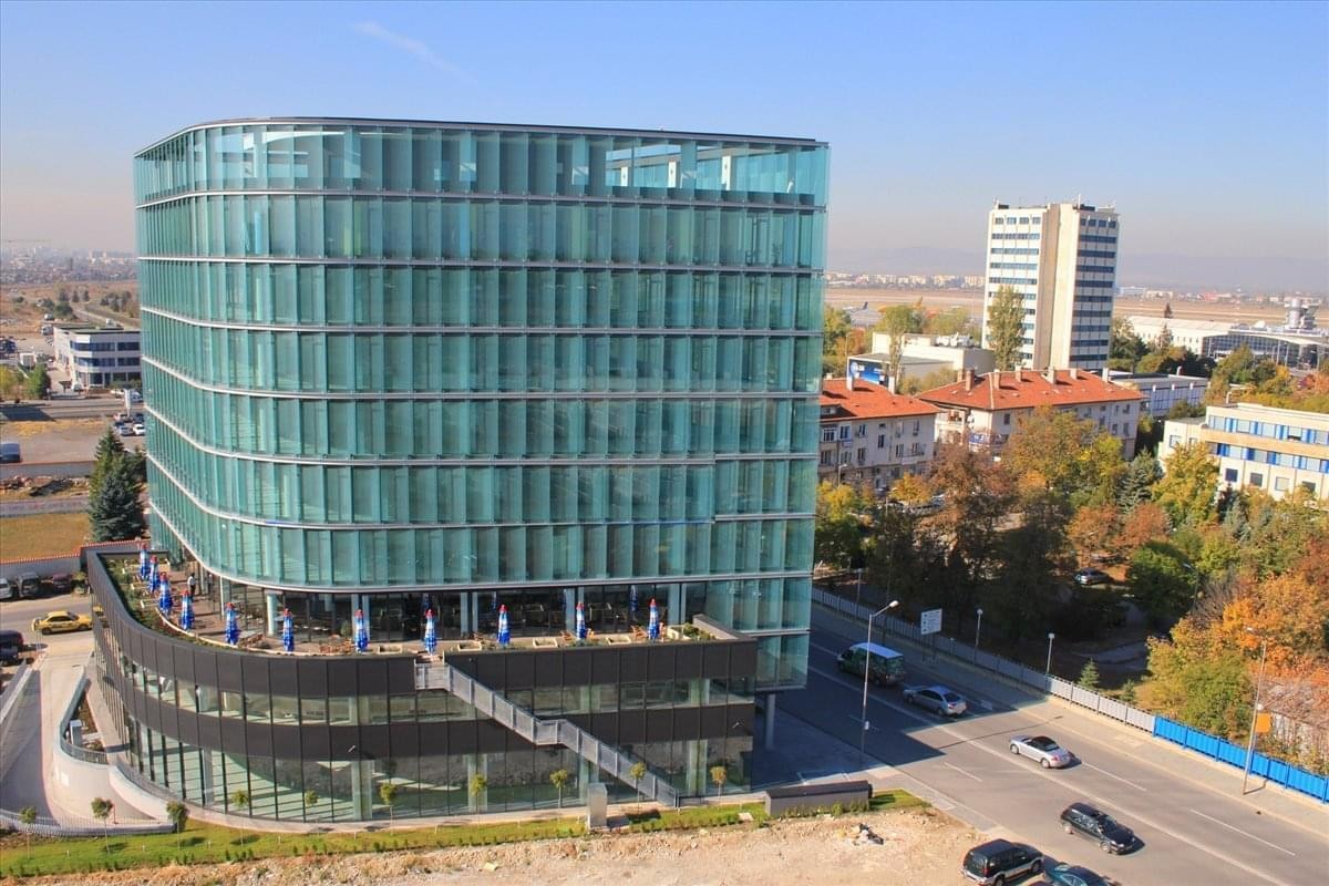 Exterior view of the glass-facade 80 Christopher Columbus Boulevard, Sofia, Bulgaria - near Sofia Airport.