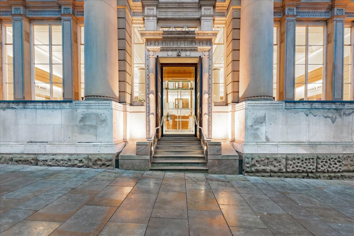 Classic stone facade and pillared entrance of The Old Bank of England, 82 King Street.