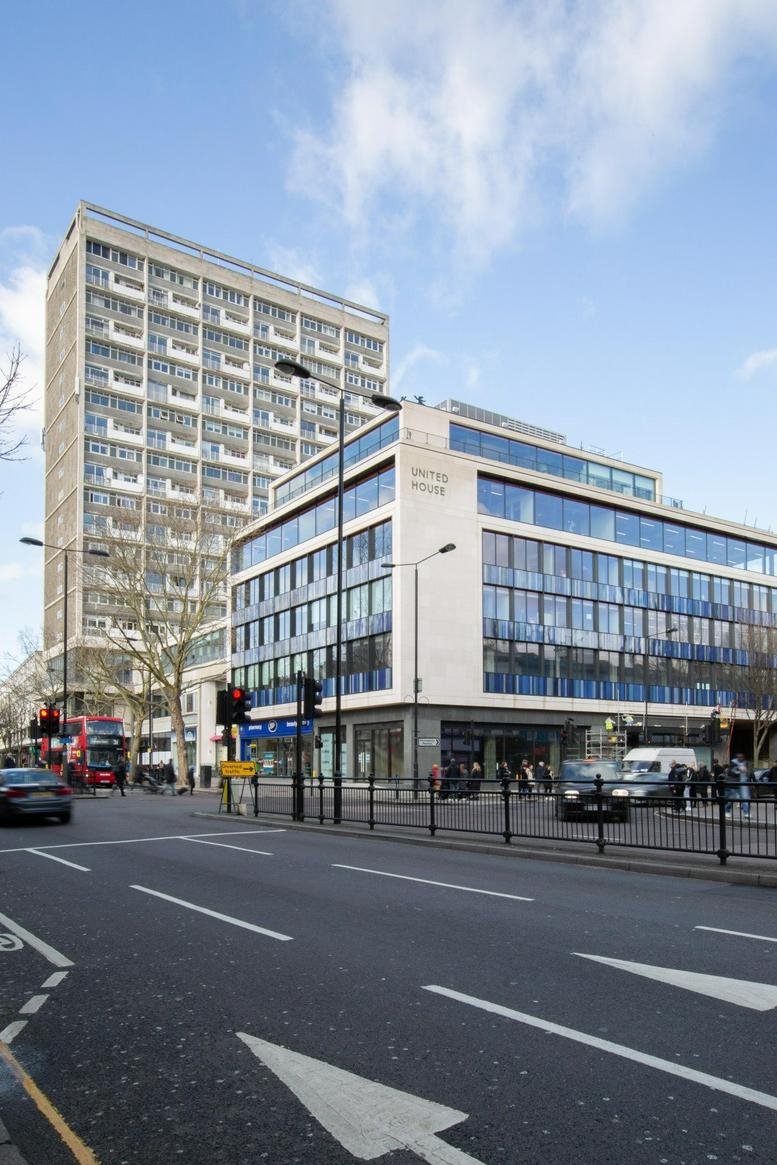Exterior view of the United House building at 9 Pembridge Road featuring a modern facade and high-rise tower.