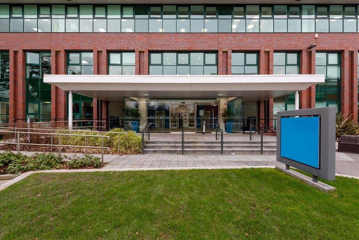 Exterior view of the brick facade and entrance at Adamson House, Towers Business Park.