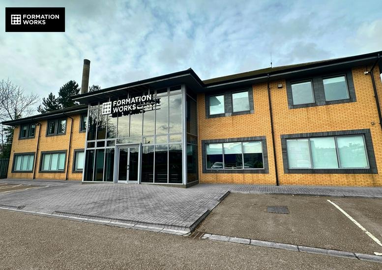 The brick and glass exterior of Adelaide House, Hawthorn Business Park in Belfast.