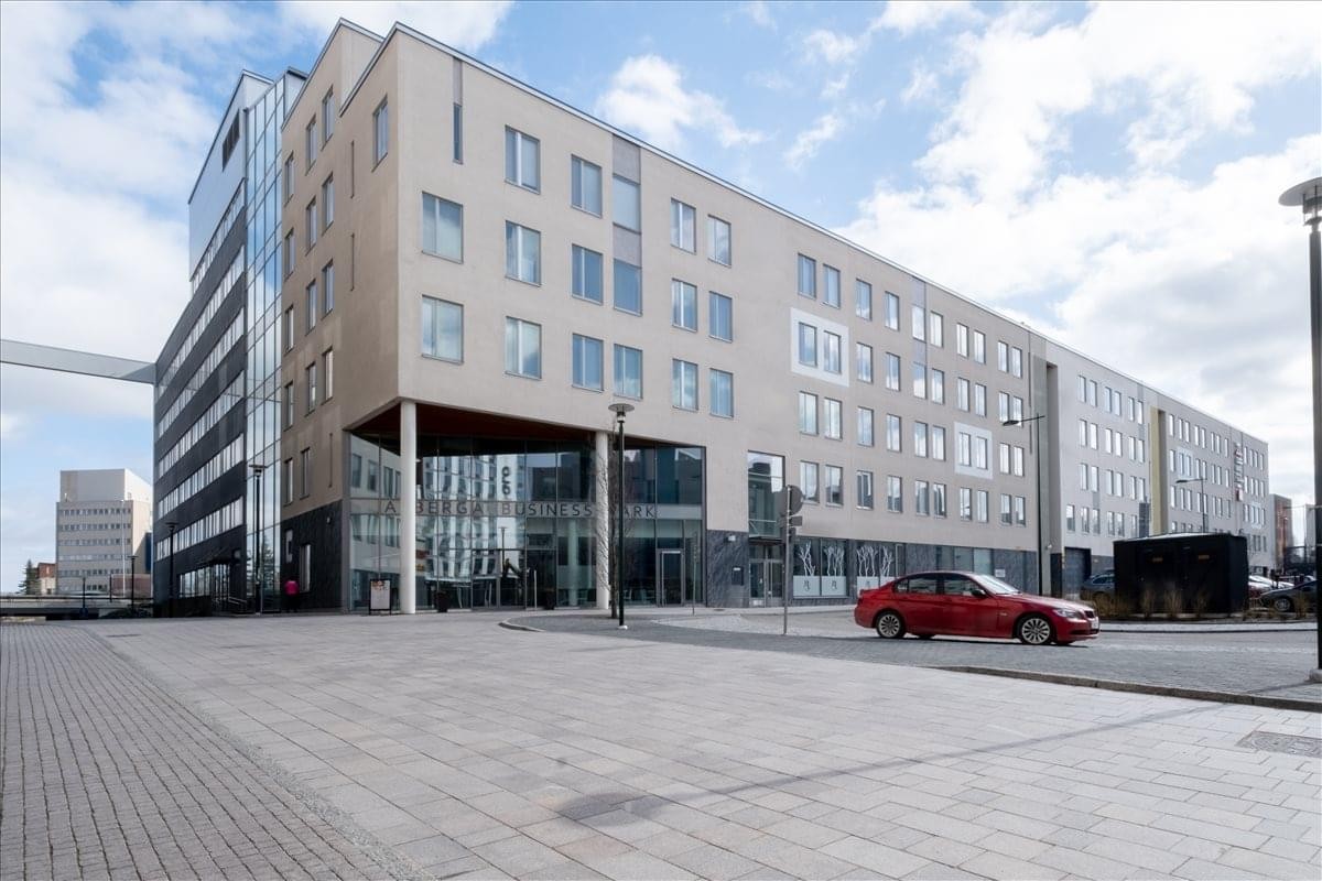 Exterior view of the modern brick and glass facade at Alberga Business Park.