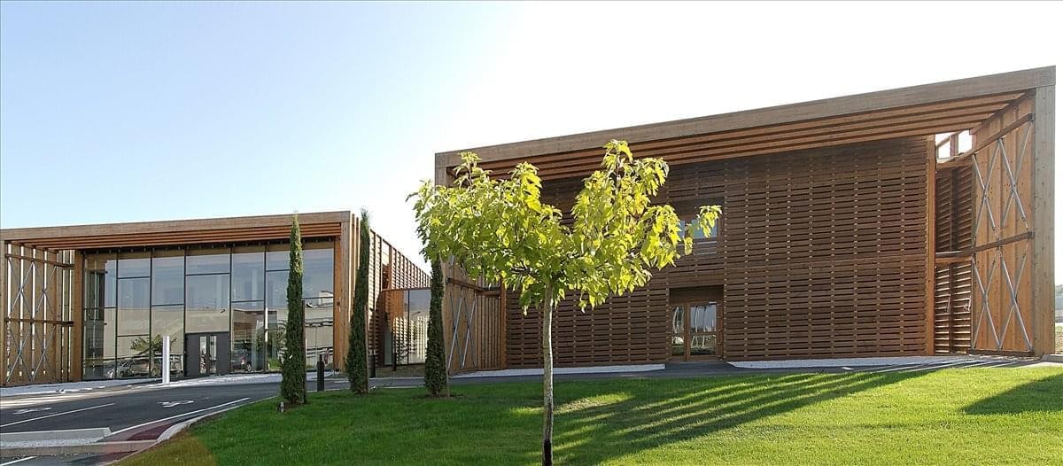 Exterior view of the modern timber-clad building at Albipôle Zone, 8 Avenue de la Martelle.