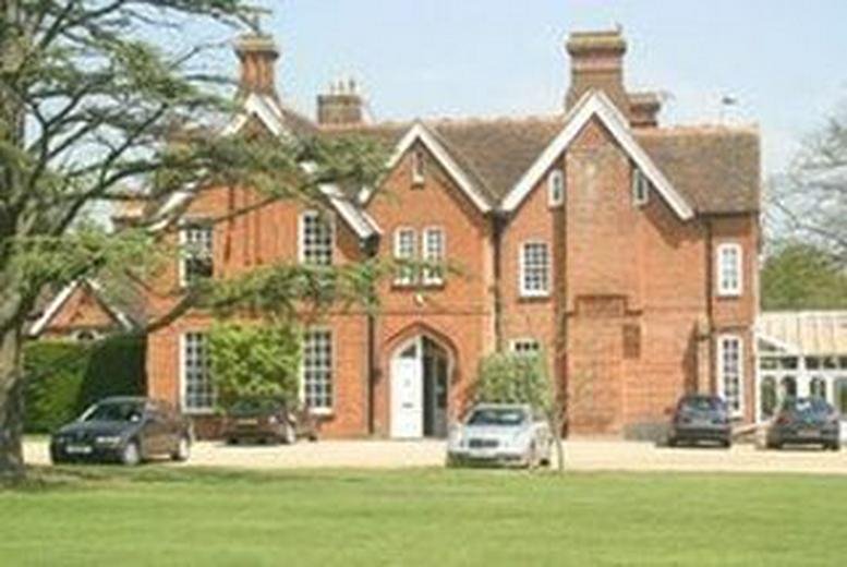 Exterior view of the historic red brick facade at Ashridge Manor.