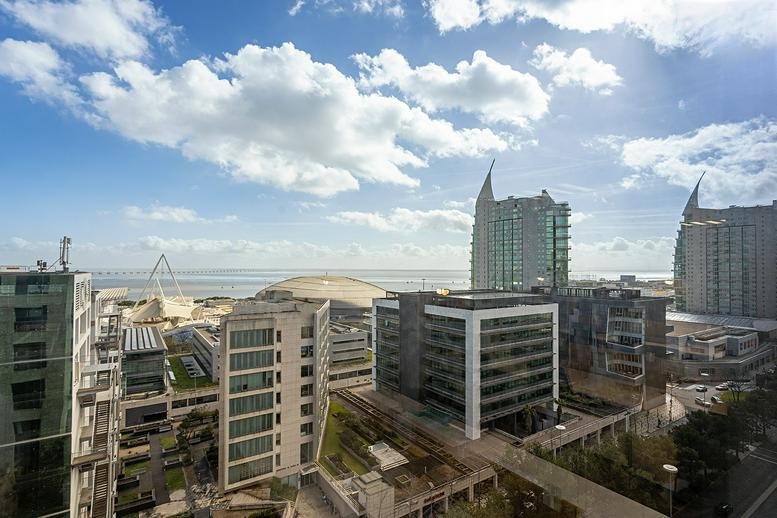 City skyline view from Edificio Infante 11ºA showing the modern architecture of Parque das Nações.