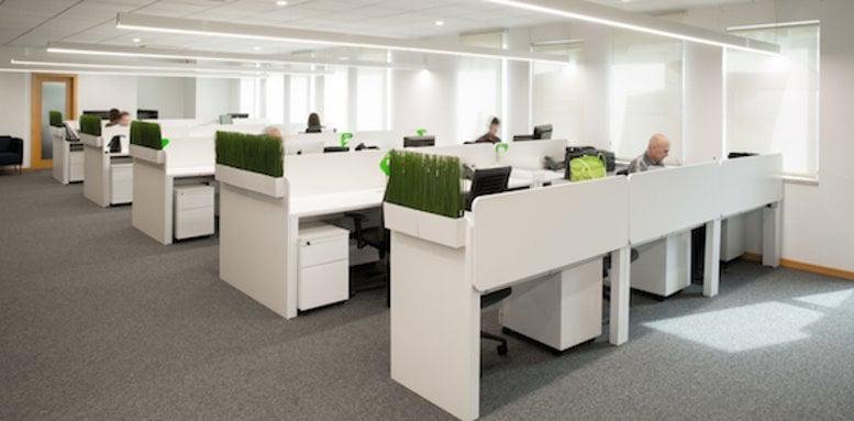 Spacious open-plan workspace at Avenida da República 6, 7th Floor, Avenidas Novas, Lisbon with white desks and greenery.