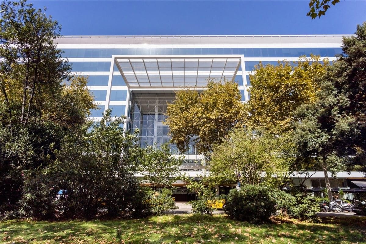 Exterior view of the modern glass facade of Avenida Diagonal 640, Caja Madrid.