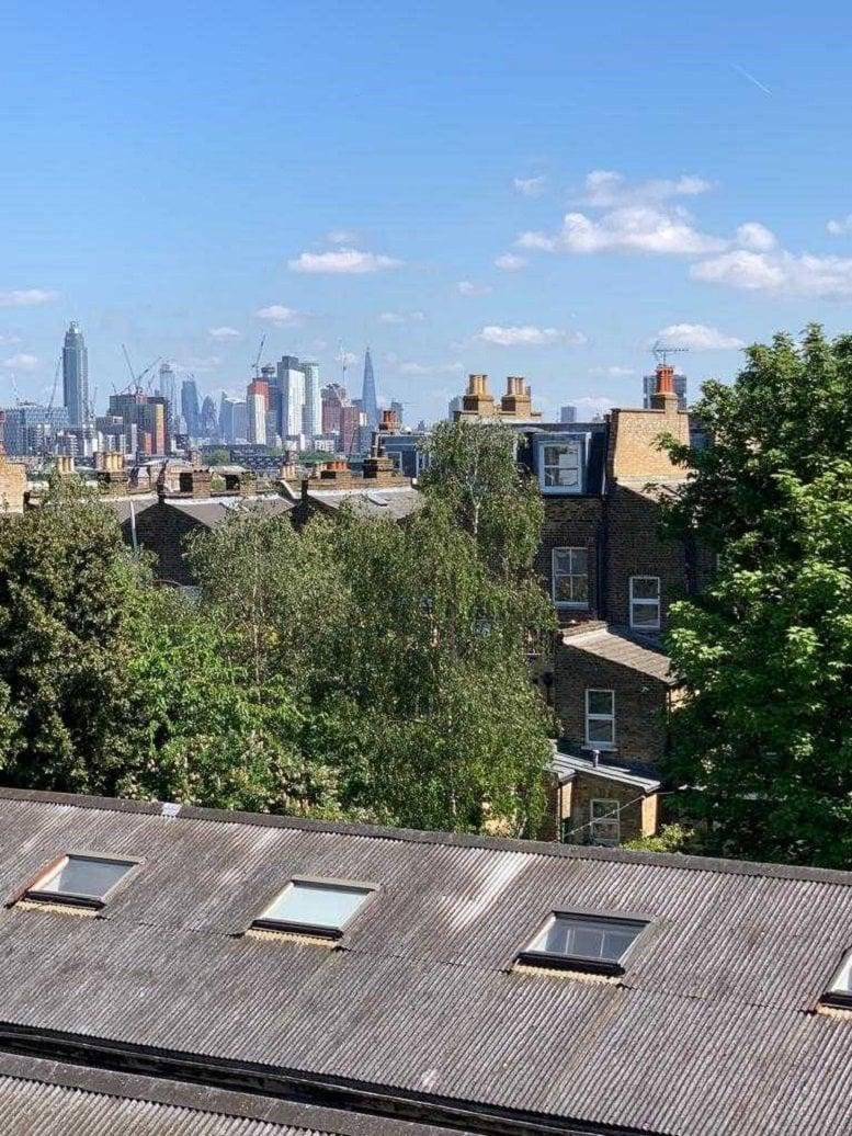 City skyline view with famous landmarks from the rooftop of Battersea Business Centre, 99-109 Lavender Hill.