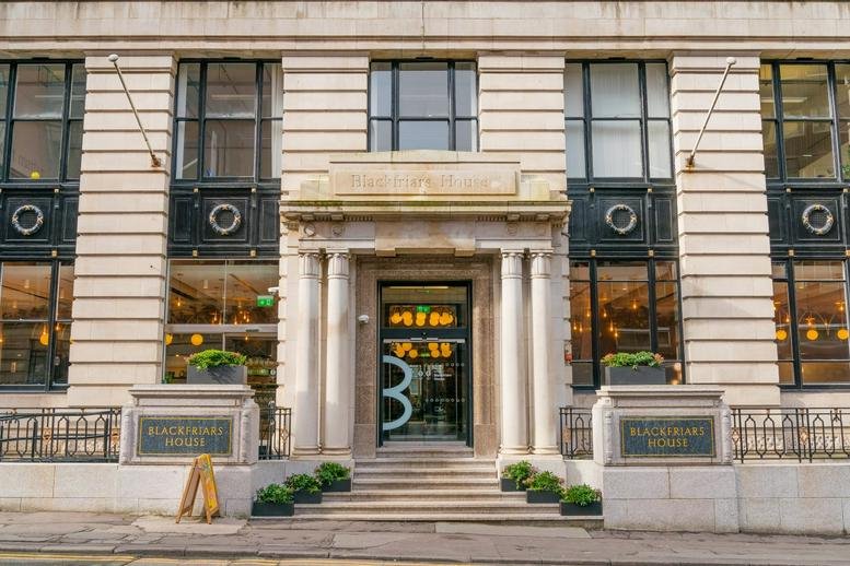 Grand stone facade and entrance of Blackfriars House.