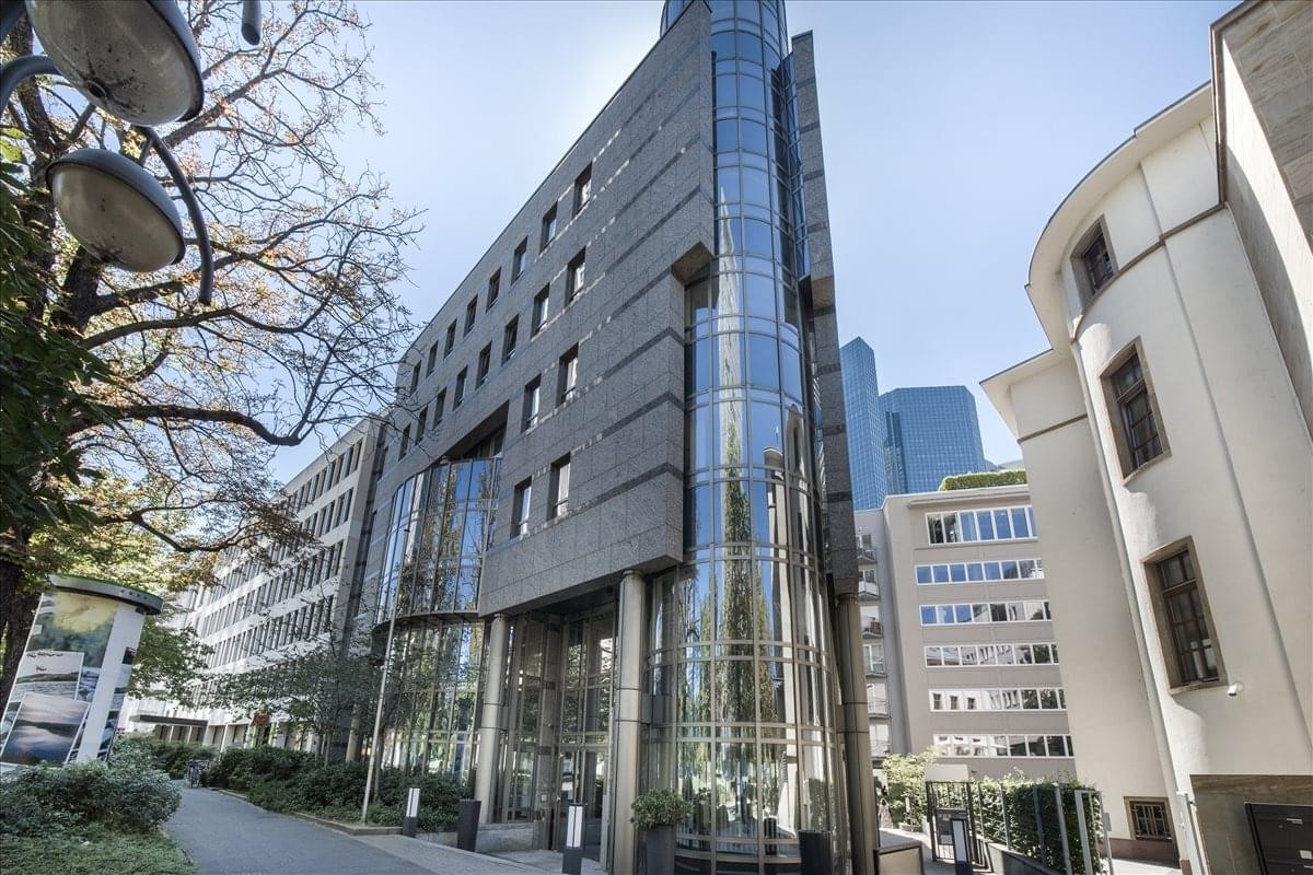 Exterior view of the dark stone and glass building at Bockenheimer Landstraße 17-19.