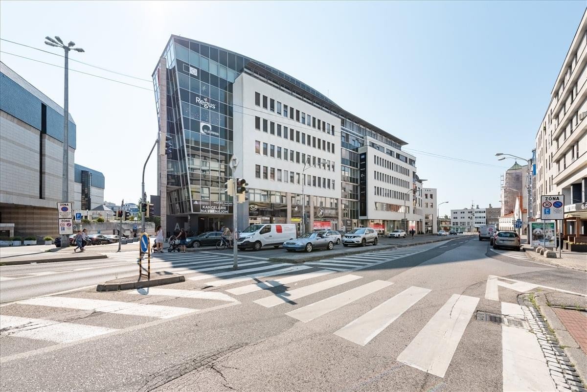 Exterior view of the modern glass and stone facade at the Bratislava Europeum Business Centre 1.