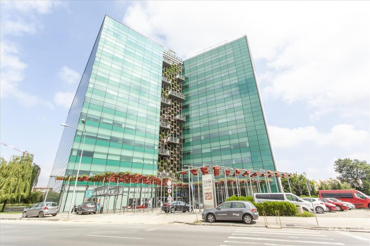 Exterior view of the modern glass-facade Green Gate building on Tudor Vladimirescu Blvd.
