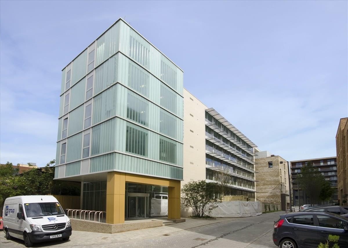 Exterior view of the modern glass-facade building at Cannon Wharf, Pell Street Surrey Quays.