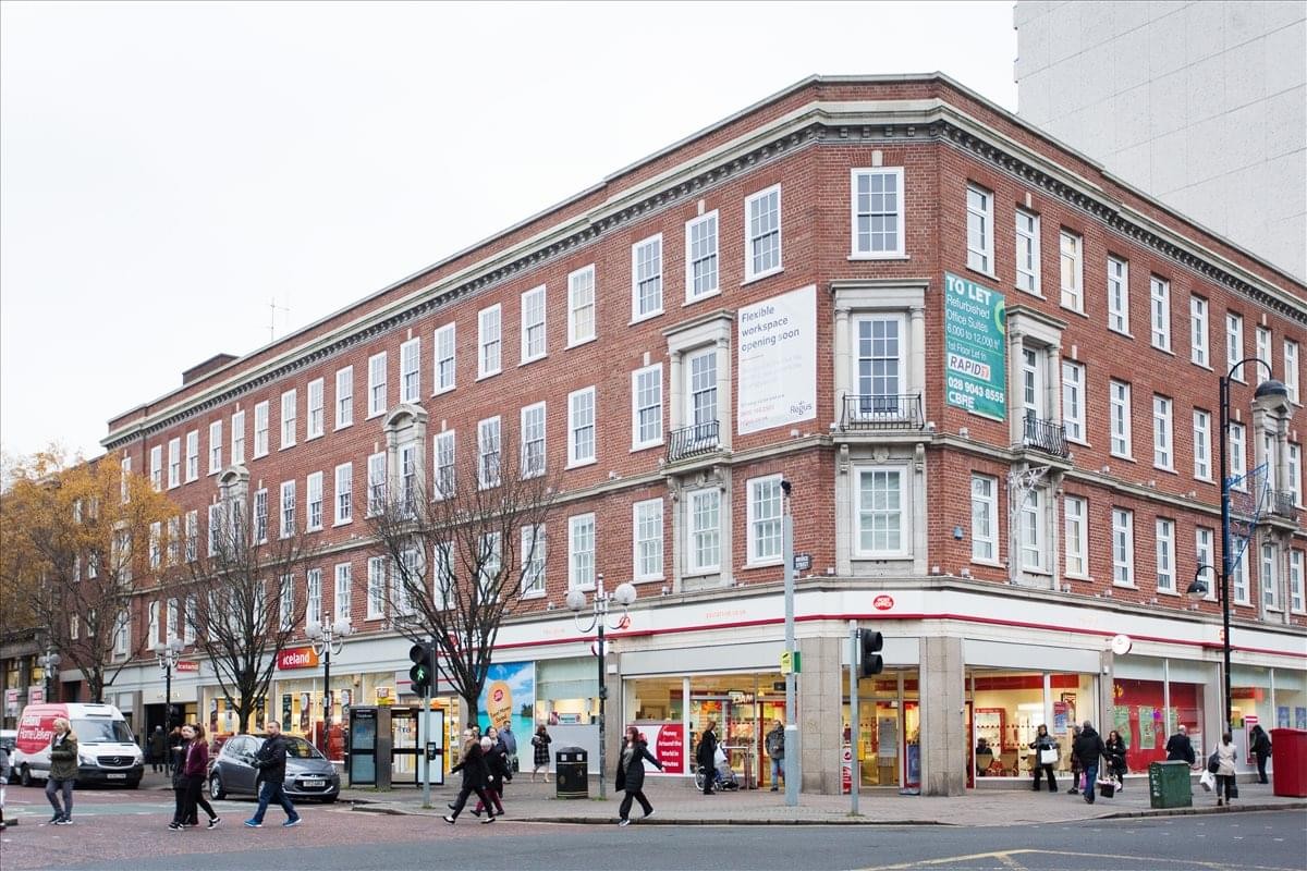 Exterior view of the traditional red brick building at Cathedral Quarter, 12 Bridge Street.