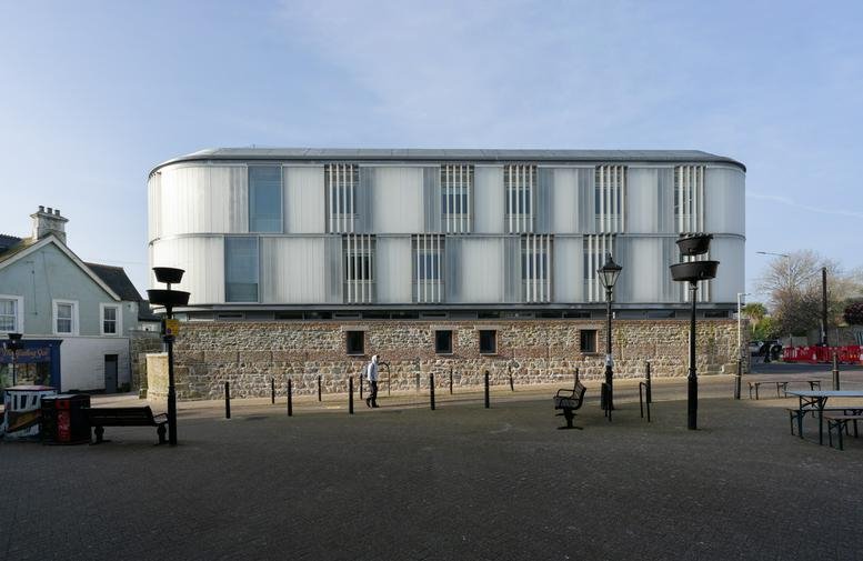 Exterior view of the Pixel, Causewayhead building showing the unique stone base and modern glass upper floors.