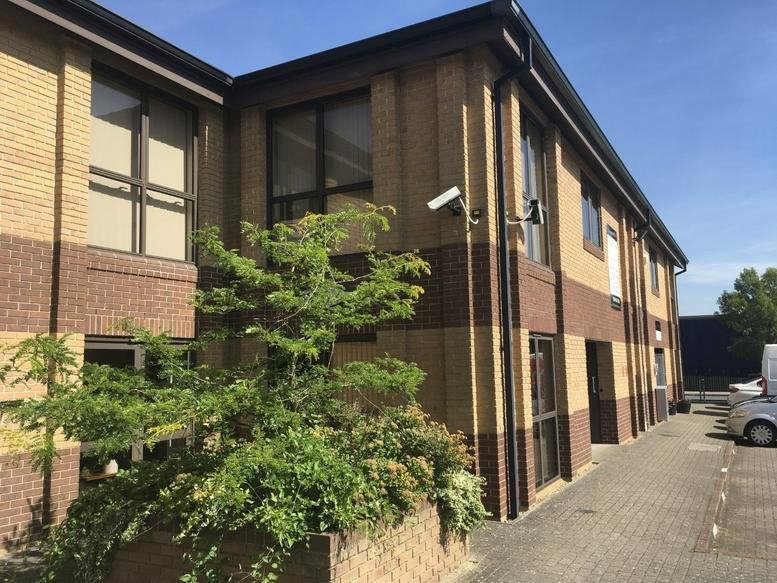 Exterior brick facade of Cavalier Court & Lansdowne Court, Bumpers Way, Chippenham, Wiltshire.