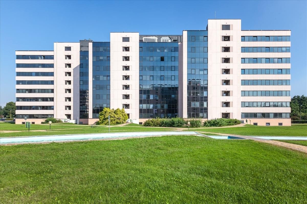 Exterior of the modern glass and white panelled Centro Direzionale Colleoni, Palazzo Cassiopea 3.