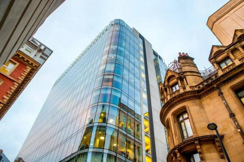 Exterior view of the curved glass facade at Chancery Place, 50 Brown Street.