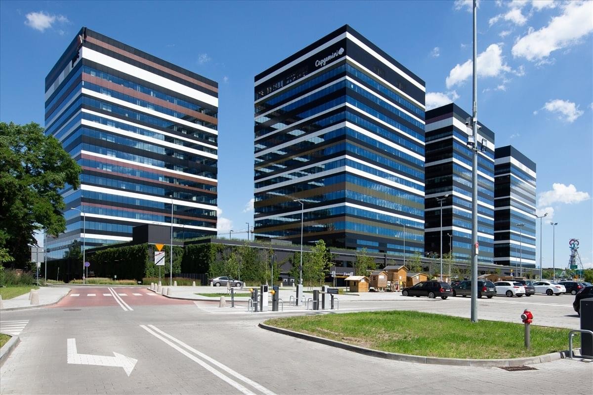Exterior view of the modern glass-facade business park at Chorzowska 150 str, Katowice.