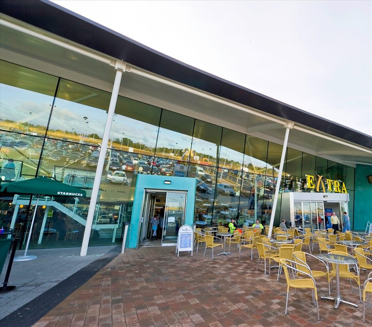 Exterior view of the glass-facade building for Regus Express at Cobham MSA.