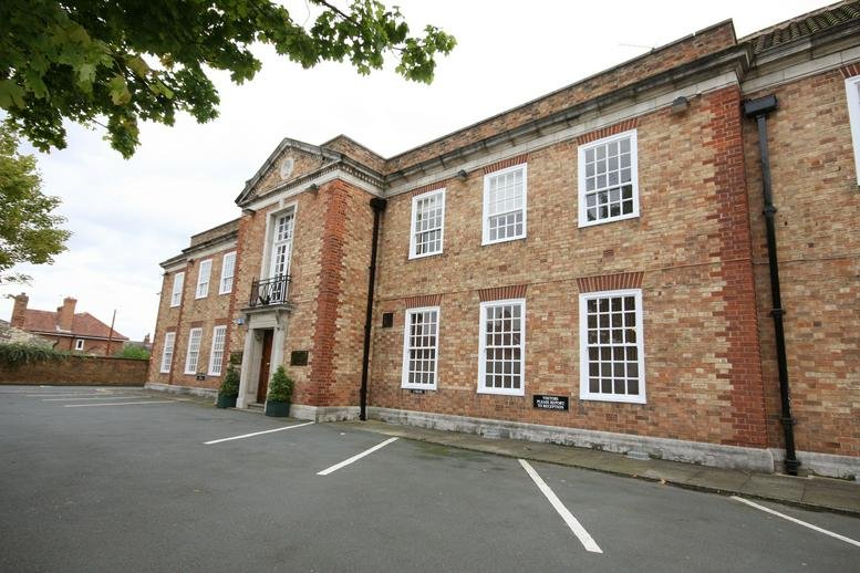 Exterior view of the historic brick and stone facade at Commer House, Tadcaster Enterprise Park.