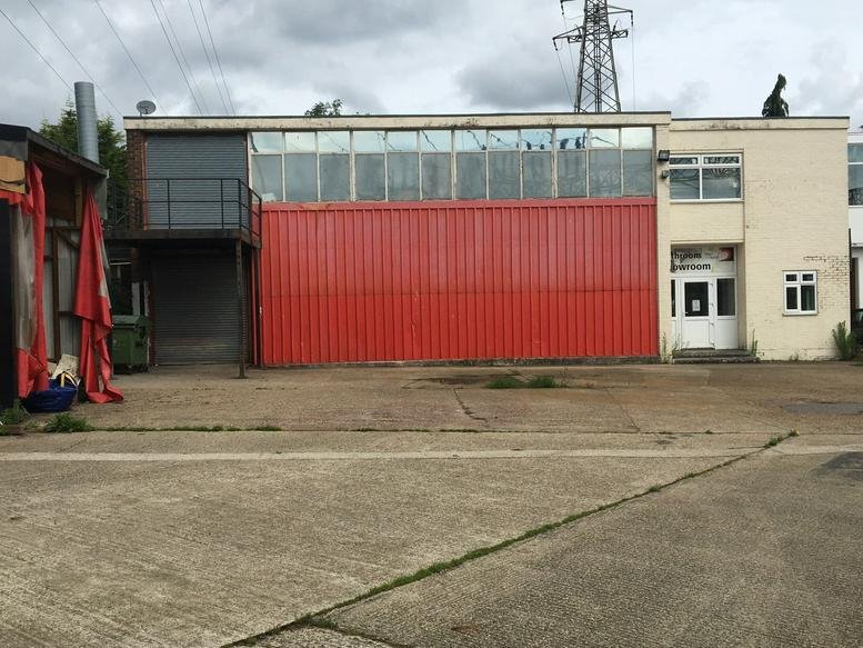 Exterior view of the industrial-style facade at Connect House, Kingston Road.