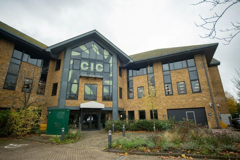 Exterior view of the brick facade and glass entrance at Crawley Innovation Centre.