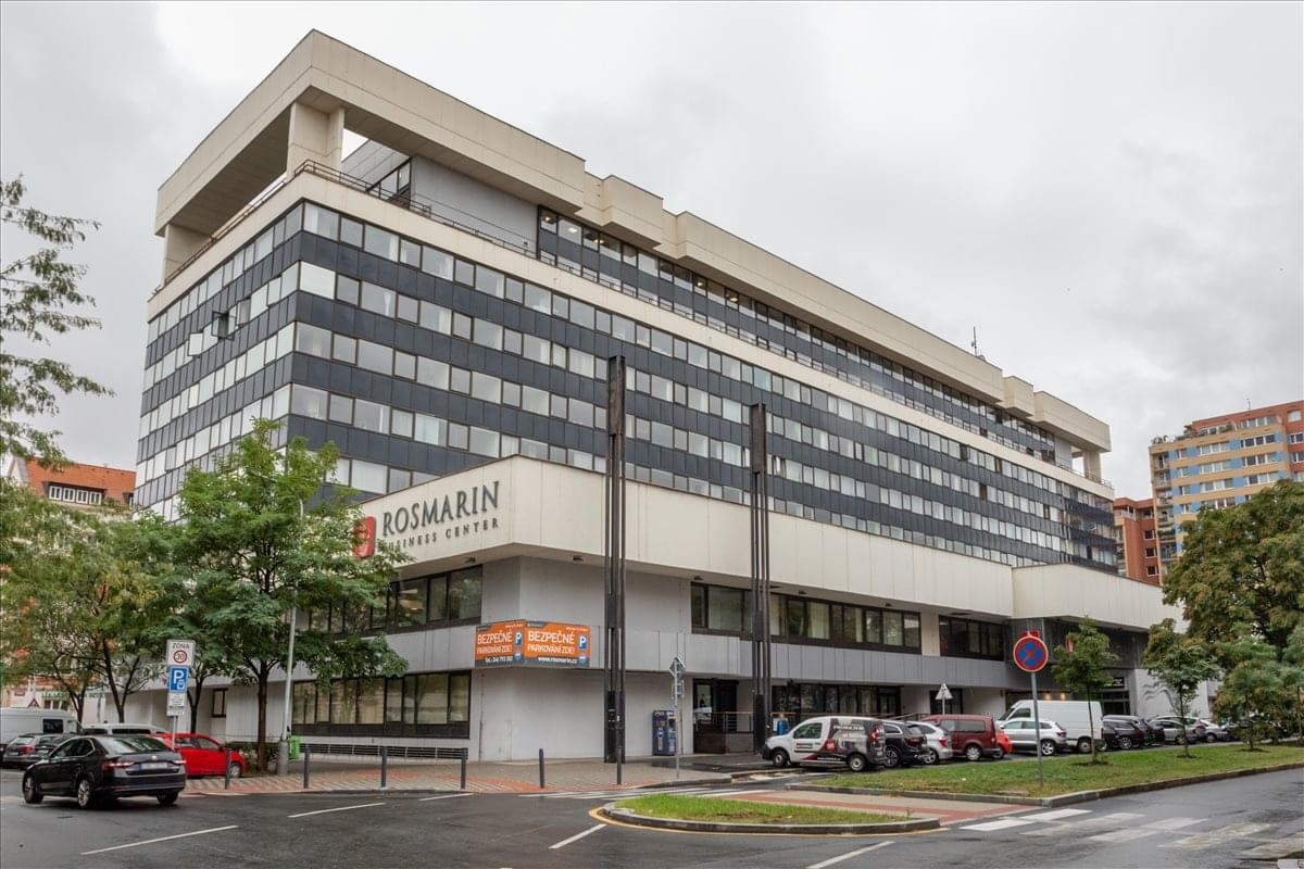 Exterior view of the modern multi-story office building at Dělnická 213/12.