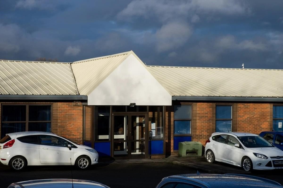 Exterior view of the brick facade and entrance at Dinnington Business Centre.
