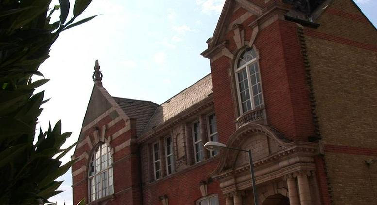 Exterior view of the red brick and stone facade of Enterprise House, 8 Essex Road, Dartford, Kent.