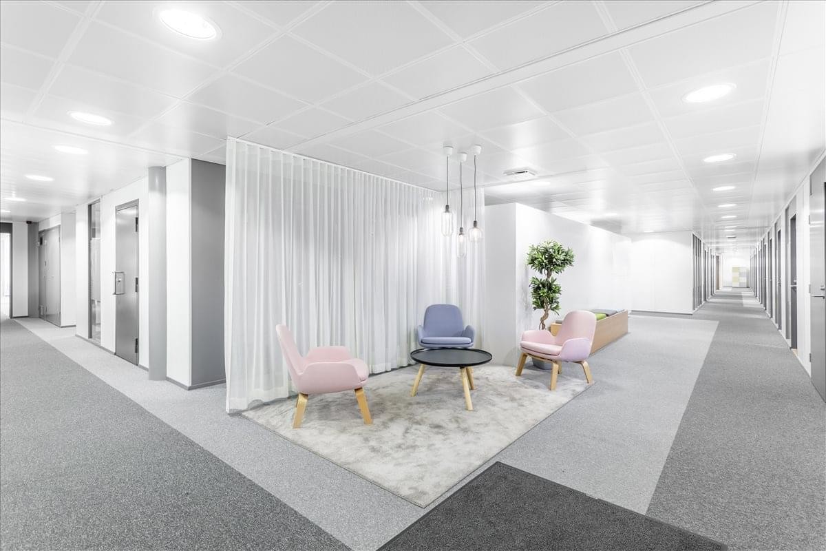 Bright reception and lounge area at Espoo Iso Omena, Puolikkotie 8, Espoo, Finland.