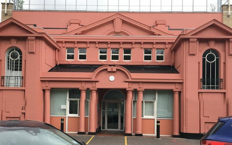 Exterior view of the ornate pink facade at Eurolink Business Centre, 49 Effra Road, Brixton.