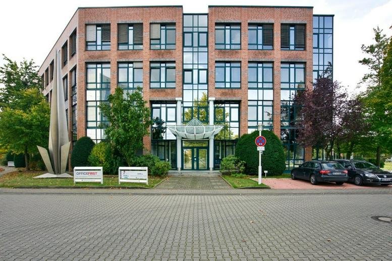 Exterior brick facade and main entrance of Europark Fichtenhain A 13a-c/B 15.