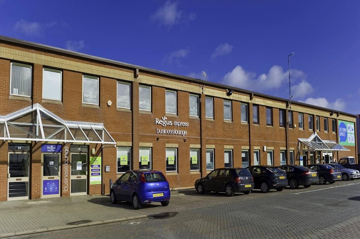 Wide exterior view of the brick facade at Fleming House, Fort Kinnaird Retail Park.