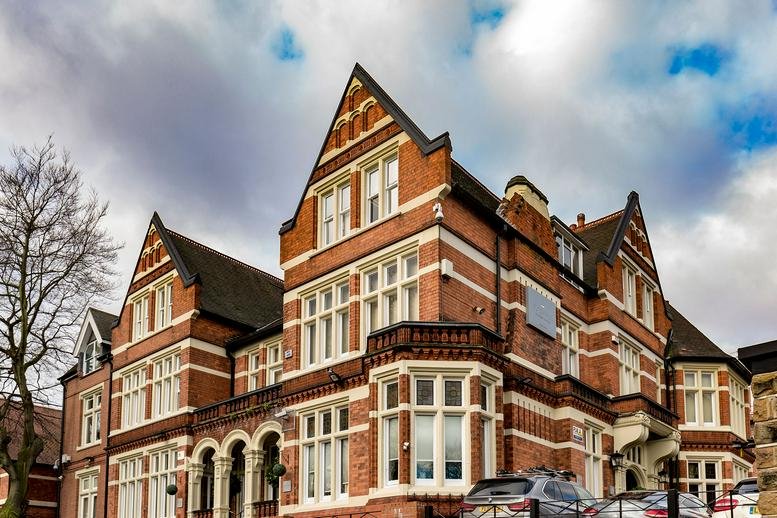 Exterior view of the red brick Victorian facade of Foxhall Business Centre.