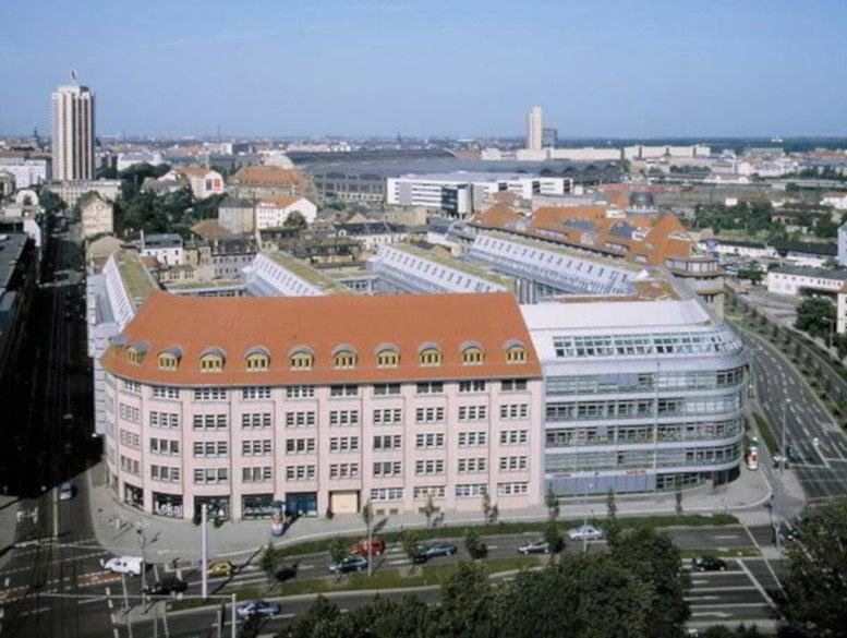 Aerial exterior view of the historic Friedrich List Platz 1 building and its modern office extensions.
