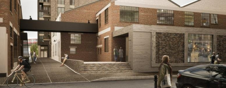 Exterior view of the brick facade and entrance at Fuel Tank, 8-12 Creekside.