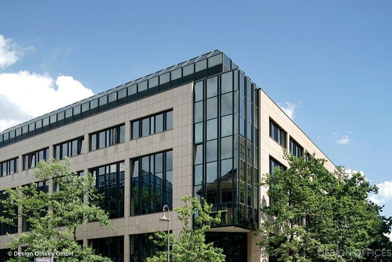 Exterior view of the modern stone and glass facade at Gervinusstraße 15-17, Frankfurt, Hesse.