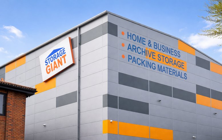 Modern exterior of Storage Giant at Gibbons Industrial Park, Unit 10 with grey and orange facade.