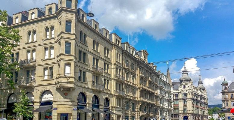 Exterior view of the historic Haus Gryffenberg building with ornate stone carvings.