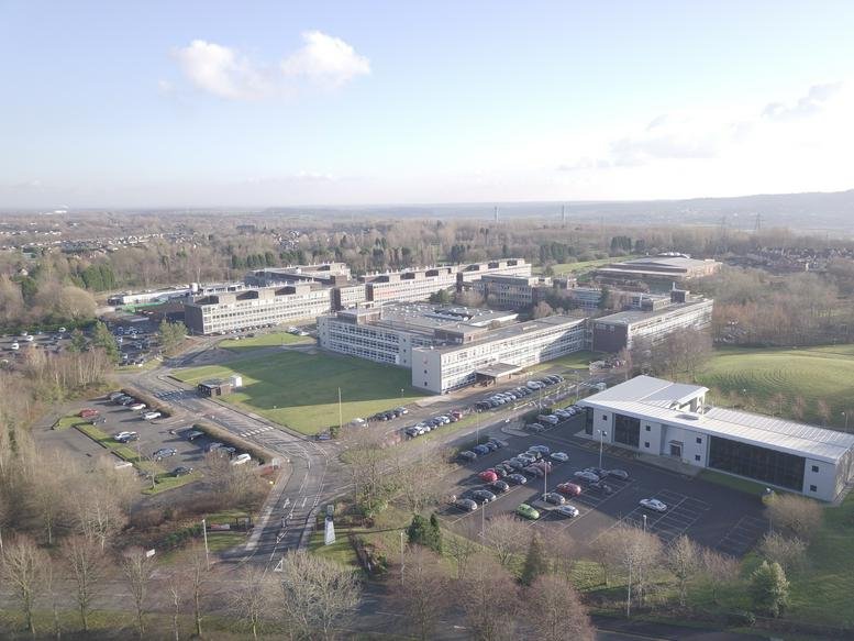 Wide aerial exterior view of the multi-building campus at The Heath, Heath Road South, Runcorn.