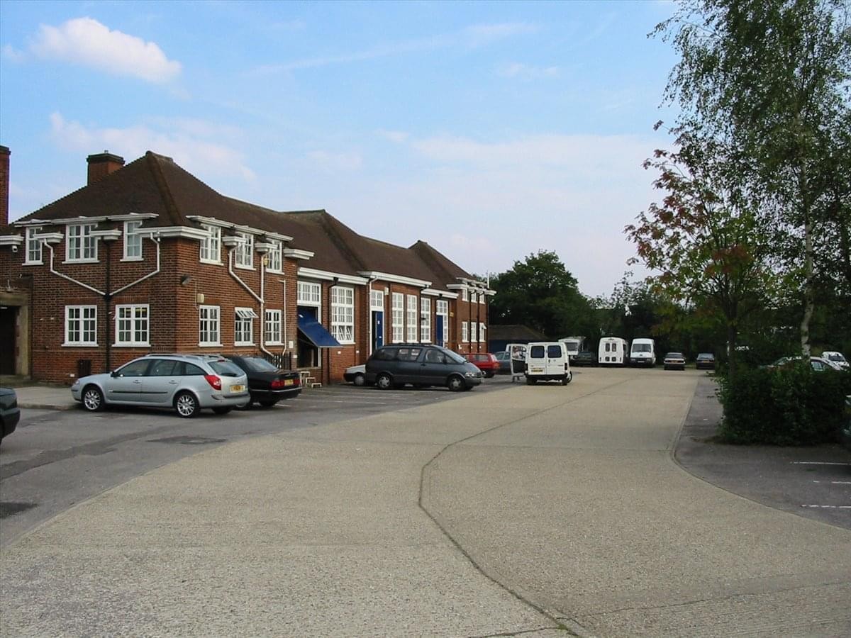Exterior view of the brick facade of the Hertfordshire Business Centre, Alexander Road.