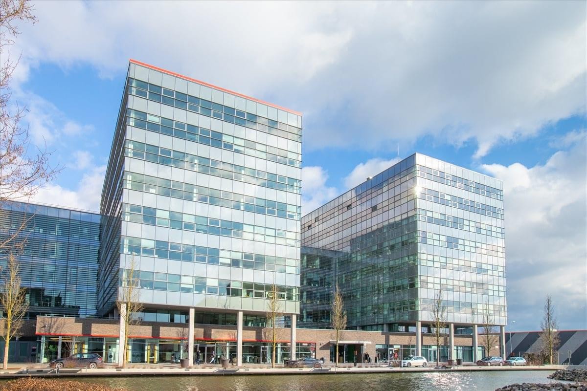 Exterior view of the modern glass buildings at Holandska Str 2/4, Brno, Czech Republic.