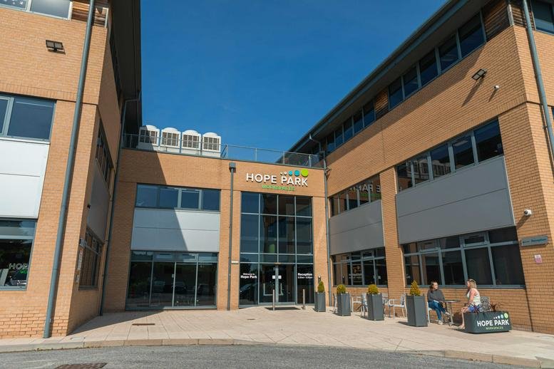 Exterior view of the brick facade and entrance at Hope Park, 15 Trevor Foster way.