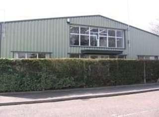 Exterior view of the industrial-style building at Hurricane Way, North Weald, Epping, Essex.