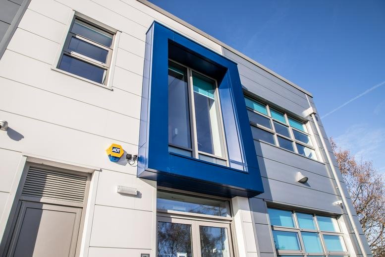 Exterior view of the contemporary white and blue facade at Innovation Way, Wilthorpe, Barnsley.